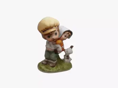 Figurine of boy and girl 3D model