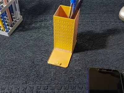 Pen holder and cell phone holder in the shape of a building Free 3D print model