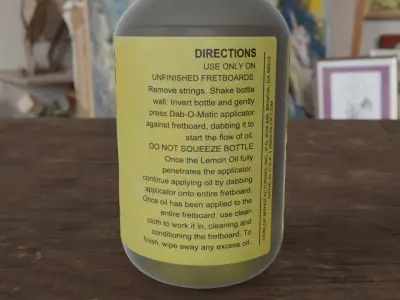 Bottle of olive oil on table Free 3D model