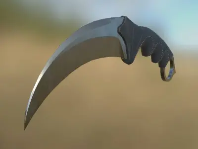 Karambit knife on grassy field Low-poly 3D model