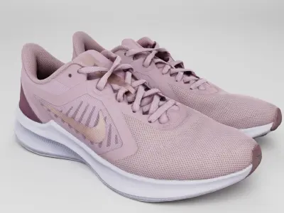Pair of running womans shoes Nike pink sneakers sport  3D model