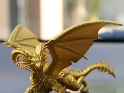 Dragon gold toy on dashboard of car 3D print model
