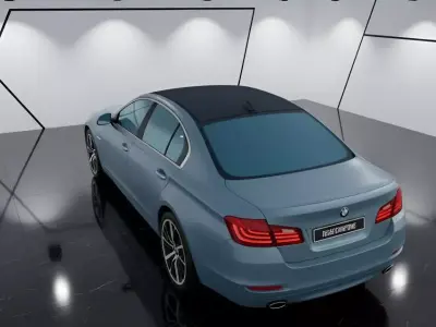 Luxury Blue Sedan in a Modern Showroom Low-poly 3D model