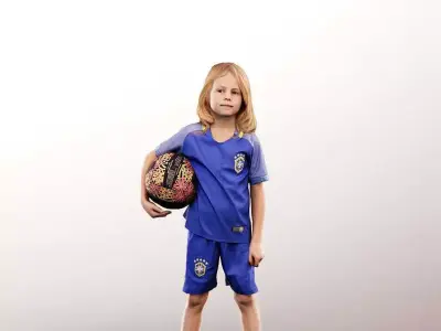 Fynn 12966 - Standing Young Boy Playing Soccer Low-poly 3D model