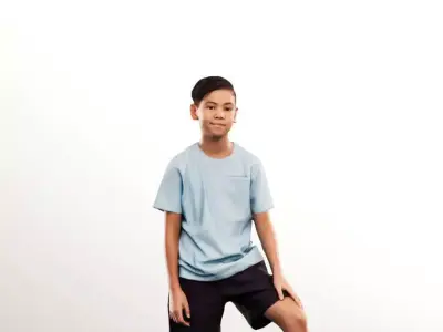 Jordan 12481 - Standing Asian Boy With Soccer Ball Low-poly 3D model