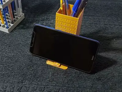 Pen holder and cell phone holder in the shape of a building Free 3D print model