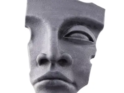 Face sculpture on the wall 3D model