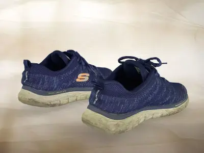 A pair of used Skechers 012 Low-poly 3D model
