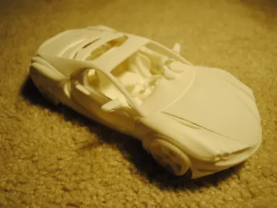 3D printable car with movable doors hoods steering wheel and ... Free 3D print model