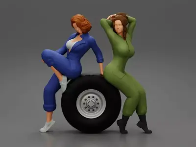 Two sexy girls in mechanic suits are sitting on a truck tire 3D print model