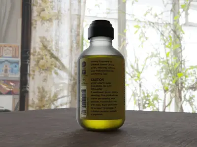 Bottle of olive oil on table Free 3D model