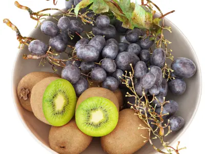 bowl of black grapes and kiwi fruit 3D model