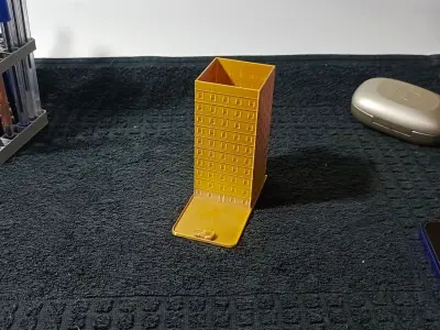 Pen holder and cell phone holder in the shape of a building Free 3D print model