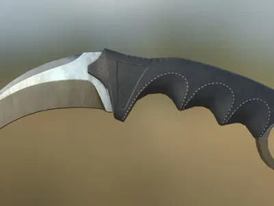 Karambit knife on grassy field Low-poly 3D model