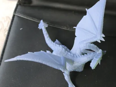 Dragon gold toy on dashboard of car 3D print model