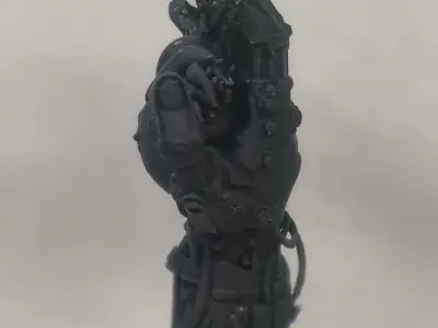 Cybernetic Hand Holding a Heart Free 3D print model