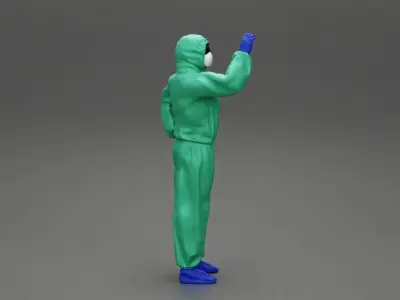 man wearing antivirus suit standing and holding 3D print model