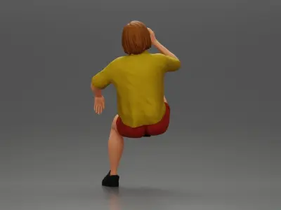 woman sitting on chair hugging her pulled-up leg while drinking 3D print model