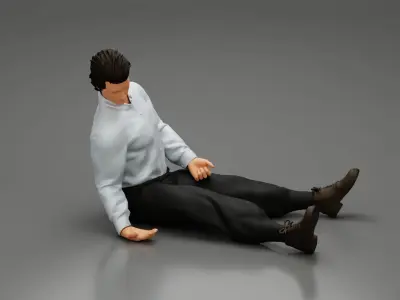 Accident of a male worker sitting on the floor with an injured 3D print model