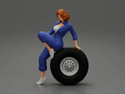 Two sexy girls in mechanic suits are sitting on a truck tire 3D print model