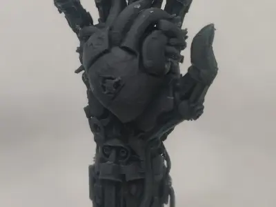 Cybernetic Hand Holding a Heart Free 3D print model