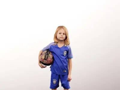Fynn 12966 - Standing Young Boy Playing Soccer Low-poly 3D model