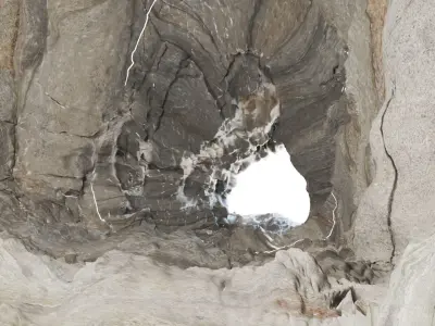 Caves rock formation with hole in it Free low-poly 3D model