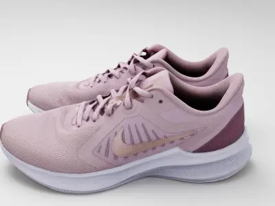 Pair of running womans shoes Nike pink sneakers sport  3D model
