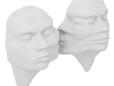 Abstract sculptures of faces on the wall 3D model