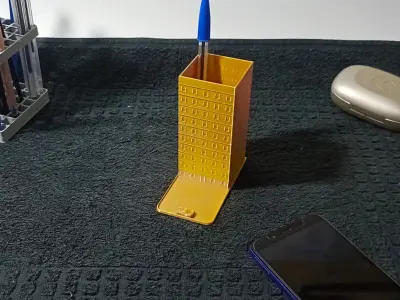 Pen holder and cell phone holder in the shape of a building Free 3D print model