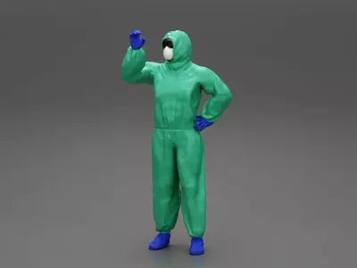 man wearing antivirus suit standing and holding 3D print model