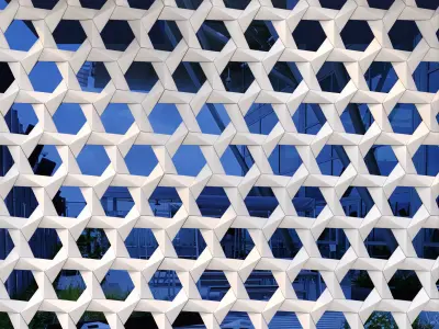 GRC Stars facade panels on a reflective blue glass 3D model