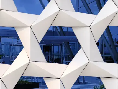 GRC Stars facade panels on a reflective blue glass 3D model