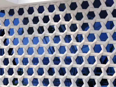 GRC Stars facade panels on a reflective blue glass 3D model