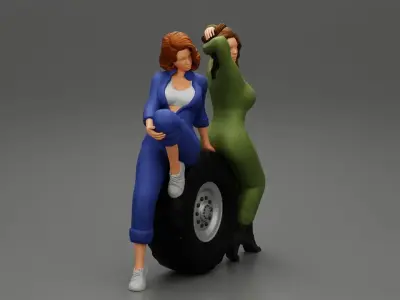 Two sexy girls in mechanic suits are sitting on a truck tire 3D print model