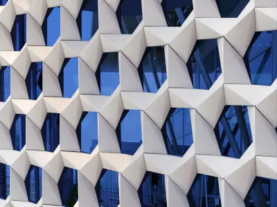 GRC Stars facade panels on a reflective blue glass 3D model