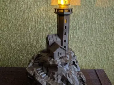 Low poly lighthouse on island Free 3D print model