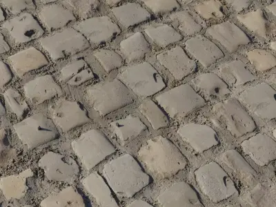 Dusty Cobblestone Street With Loose Mortar Texture