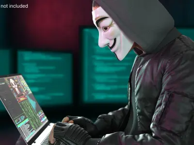  Hacker in Anonymous Mask Sitting Pose 