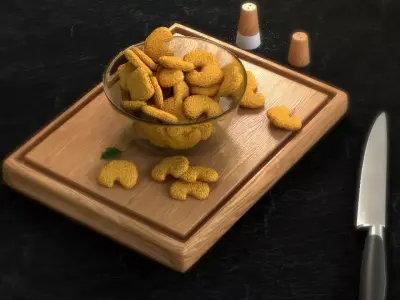 Nuggets bowl of peanuts and knife on cutting board Low-poly 3D model