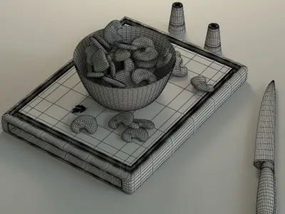 Nuggets bowl of peanuts and knife on cutting board Low-poly 3D model