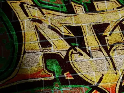 Brick Wall Worn and Cracked with Graffiti PBR Texture Texture