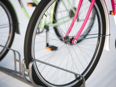 Bike stand with two colorful bikes 3D model