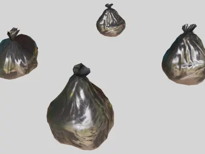 Garbage set trash cans and books on table Low-poly 3D model