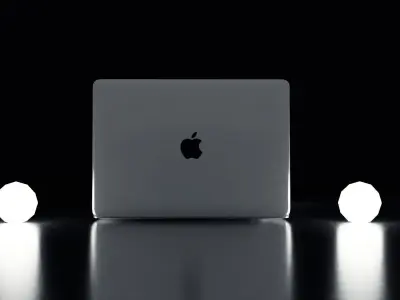 Macbook laptop on table with two light bulbs 3D model