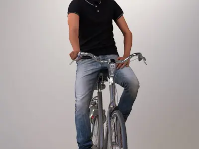Pre-posed 3D man on a bike with realistic hair 3D model
