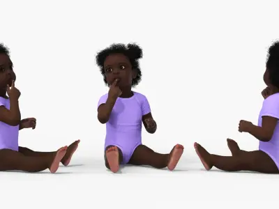  African Baby Girl Wearing Bodysuit Sitting 