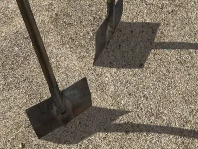 Spades in sand Low-poly 3D model