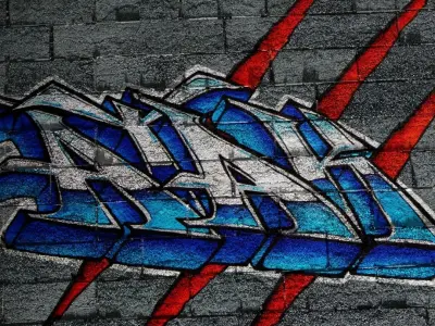 Stone Brick Wall with Wolverine Graffiti PBR Texture Texture