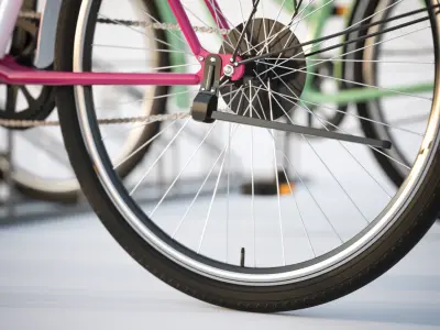 Bike stand with two colorful bikes 3D model
